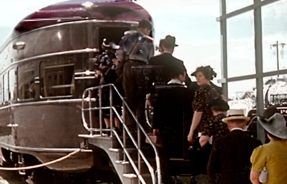 people going up stairs to board train
