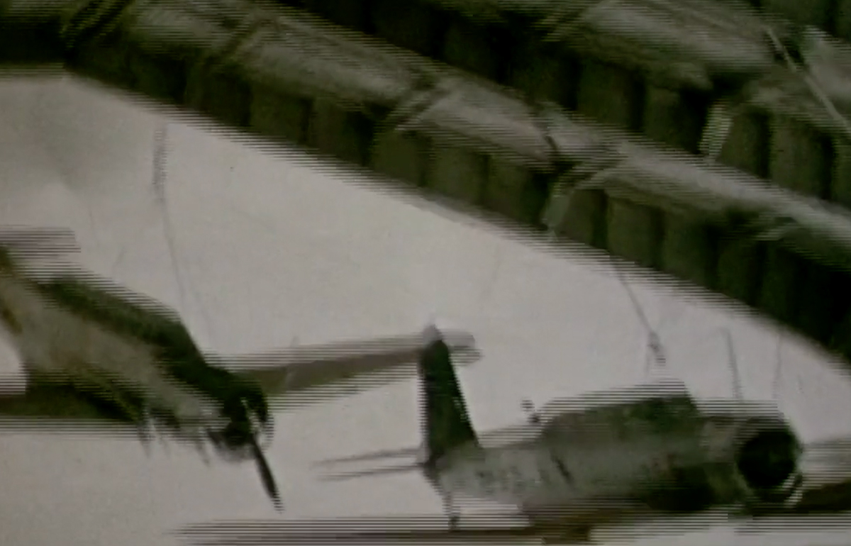 two planes flying inside hall